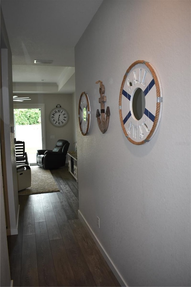 146 Via Madrid Dr, Ormond Beach, FL 32176 - hallway featuring dark wood-type flooring and baseboards