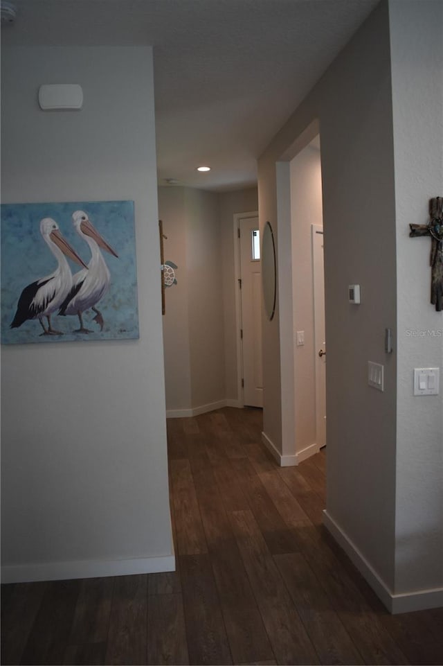 146 Via Madrid Dr, Ormond Beach, FL 32176 - hall with dark wood-style floors and recessed lighting