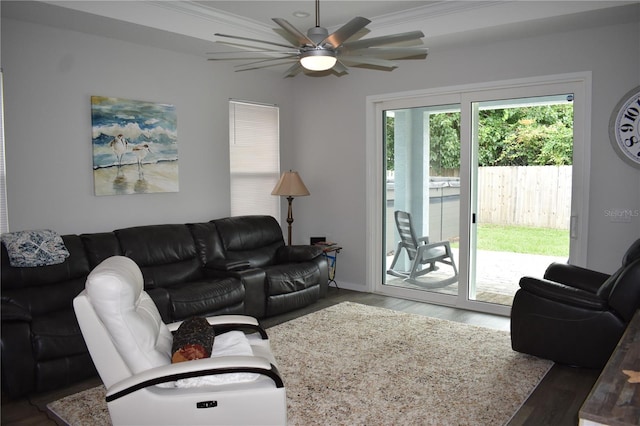 146 Via Madrid Dr, Ormond Beach, FL 32176 - living area featuring wood finished floors, a ceiling fan, and crown molding
