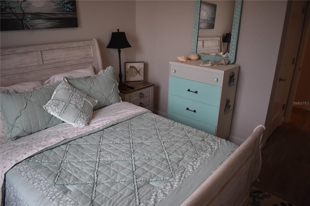 146 Via Madrid Dr, Ormond Beach, FL 32176 - bedroom featuring wood finished floors and baseboards