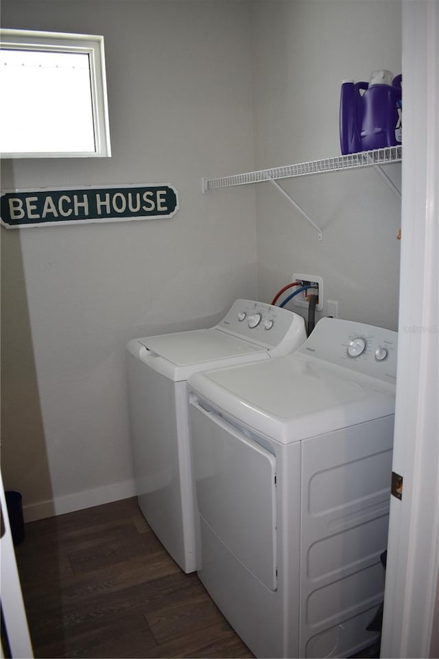 146 Via Madrid Dr, Ormond Beach, FL 32176 - laundry area with separate washer and dryer and wood finished floors