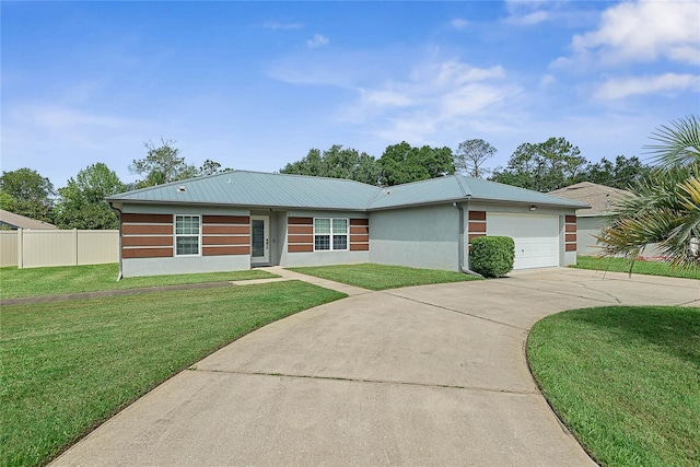 8 White Horse Ln, Palm Coast, FL 32164 - view of front of home featuring driveway, stucco siding, an attached garage, and a metal roof