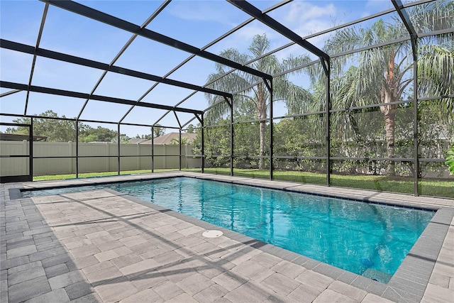 8 White Horse Ln, Palm Coast, FL 32164 - view of swimming pool with a lanai and a patio area