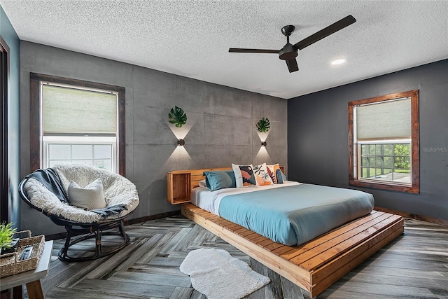8 White Horse Ln, Palm Coast, FL 32164 - bedroom with a textured ceiling and ceiling fan