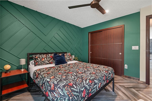 8 White Horse Ln, Palm Coast, FL 32164 - bedroom featuring a textured ceiling and ceiling fan