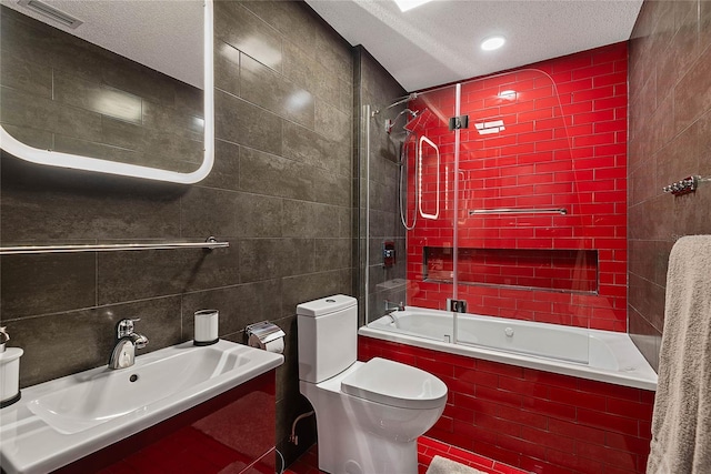8 White Horse Ln, Palm Coast, FL 32164 - full bathroom with tile walls, tiled shower / bath, a textured ceiling, and vanity