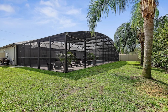 8 White Horse Ln, Palm Coast, FL 32164 - view of yard with a patio and glass enclosure