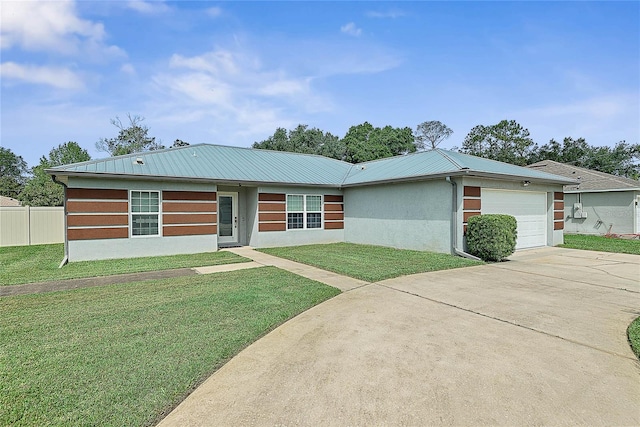 8 White Horse Ln, Palm Coast, FL 32164 - view of front facade with a garage, stucco siding, driveway, and a metal roof