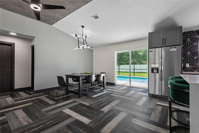 66 Randolph Dr, Palm Coast, FL 32164 - dining space with vaulted ceiling and ceiling fan