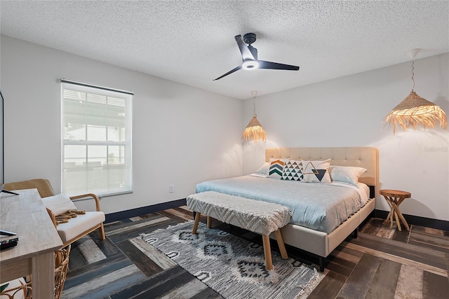 66 Randolph Dr, Palm Coast, FL 32164 - bedroom with wood finished floors, ceiling fan, and a textured ceiling
