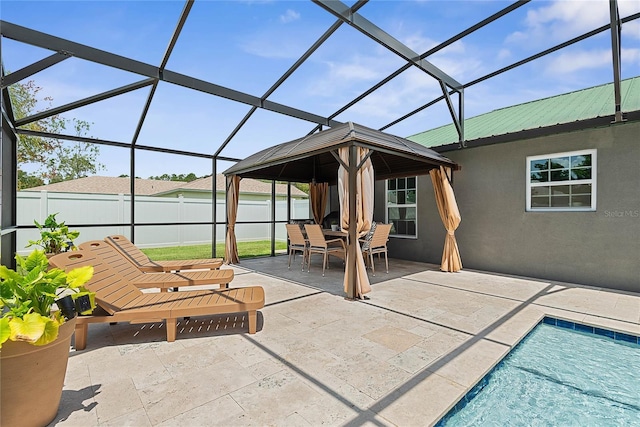 66 Randolph Dr, Palm Coast, FL 32164 - view of patio / terrace with glass enclosure and outdoor dining area