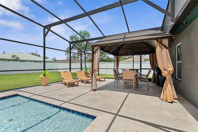 66 Randolph Dr, Palm Coast, FL 32164 - fenced backyard with a patio area, outdoor dining space, a lanai, and a gazebo