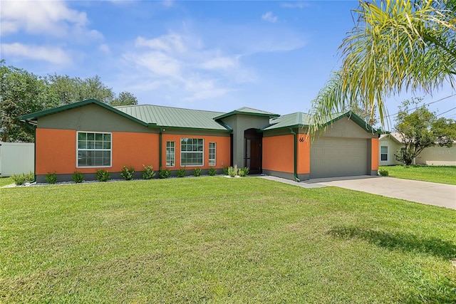 66 Randolph Dr, Palm Coast, FL 32164 - single story home with driveway, a garage, a metal roof, and stucco siding