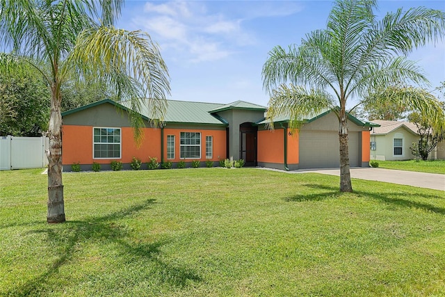 66 Randolph Dr, Palm Coast, FL 32164 - ranch-style house featuring driveway, an attached garage, and stucco siding