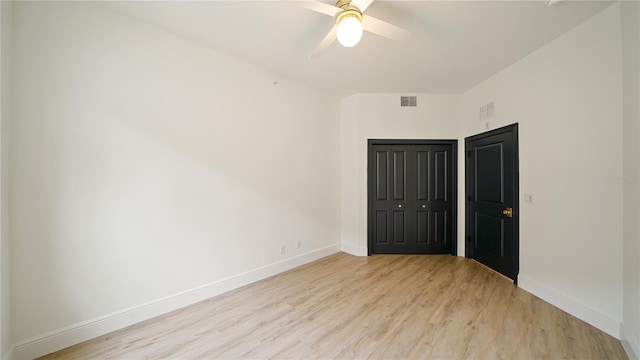 455 Riverfront Dr Unit A101, Palm Coast, FL 32137 - unfurnished bedroom featuring light wood finished floors and a ceiling fan