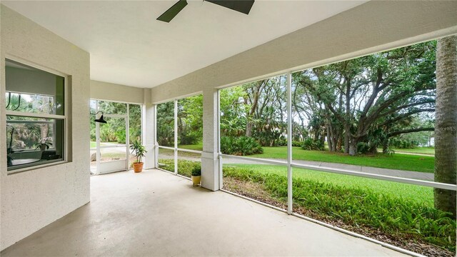455 Riverfront Dr Unit A101, Palm Coast, FL 32137 - unfurnished sunroom with a ceiling fan