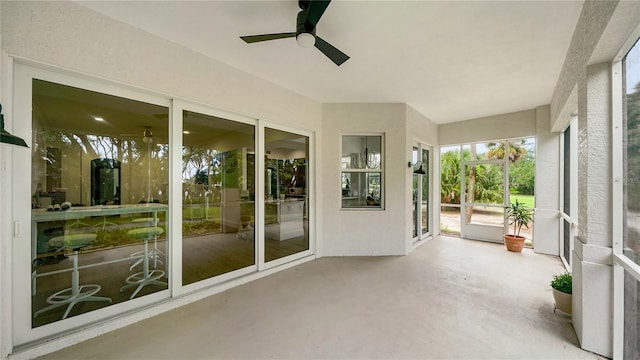 455 Riverfront Dr Unit A101, Palm Coast, FL 32137 - unfurnished sunroom with a ceiling fan