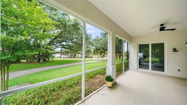 455 Riverfront Dr Unit A101, Palm Coast, FL 32137 - unfurnished sunroom with a ceiling fan and vaulted ceiling