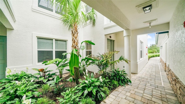 455 Riverfront Dr Unit A104, Palm Coast, FL 32137 - entrance to property featuring stucco siding