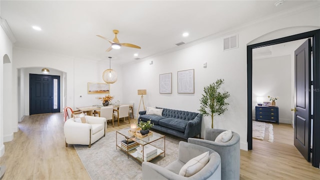 455 Riverfront Dr Unit A203, Palm Coast, FL 32137 - living area featuring arched walkways, a ceiling fan, light wood-style floors, ornamental molding, and recessed lighting