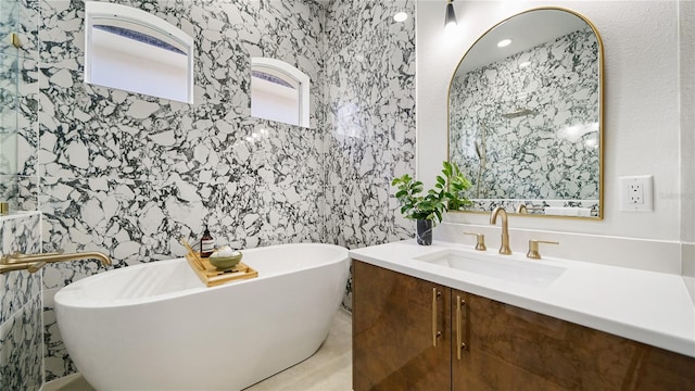 455 Riverfront Dr Unit A203, Palm Coast, FL 32137 - bathroom featuring vanity and a freestanding bath