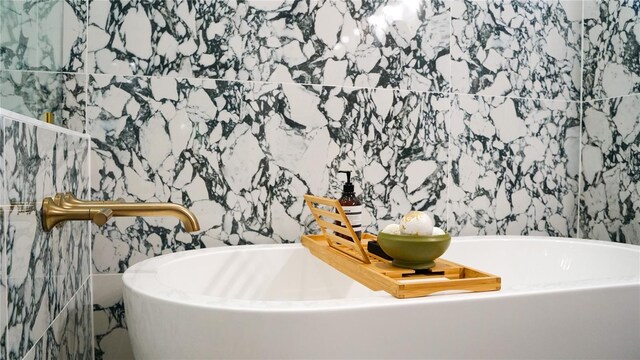 455 Riverfront Dr Unit A203, Palm Coast, FL 32137 - bathroom featuring a bathtub