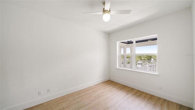 455 Riverfront Dr Unit A203, Palm Coast, FL 32137 - empty room featuring wood finished floors and a ceiling fan