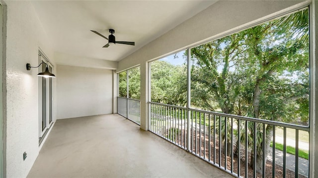 455 Riverfront Dr Unit A203, Palm Coast, FL 32137 - unfurnished sunroom with a ceiling fan and concrete floors