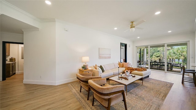 455 Riverfront Dr Unit A204, Palm Coast, FL 32137 - living area with a ceiling fan, recessed lighting, light wood-style floors, and crown molding