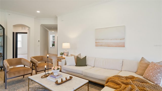 455 Riverfront Dr Unit A204, Palm Coast, FL 32137 - living area featuring arched walkways, crown molding, and recessed lighting