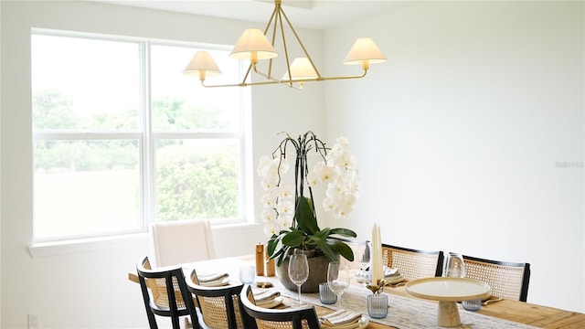 455 Riverfront Dr Unit A204, Palm Coast, FL 32137 - dining area with a chandelier