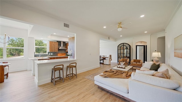 455 Riverfront Dr Unit A204, Palm Coast, FL 32137 - living area with light wood finished floors, recessed lighting, and ceiling fan
