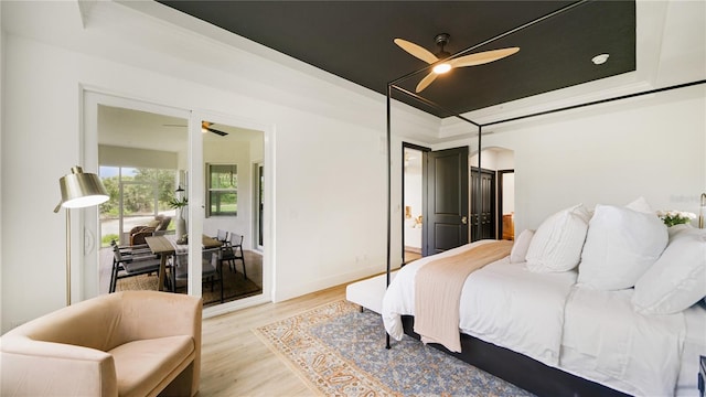 455 Riverfront Dr Unit A204, Palm Coast, FL 32137 - bedroom featuring a raised ceiling and light wood-style floors