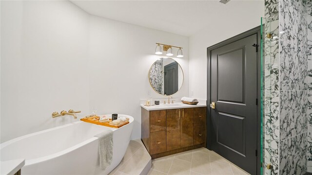 455 Riverfront Dr Unit A204, Palm Coast, FL 32137 - full bath featuring vanity, a soaking tub, and tile patterned floors