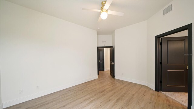 455 Riverfront Dr Unit A204, Palm Coast, FL 32137 - unfurnished bedroom with light wood-type flooring and ceiling fan