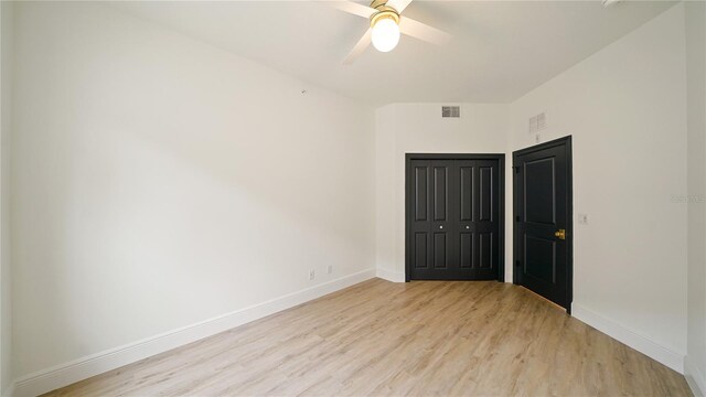 455 Riverfront Dr Unit A204, Palm Coast, FL 32137 - unfurnished bedroom featuring light wood finished floors and a ceiling fan