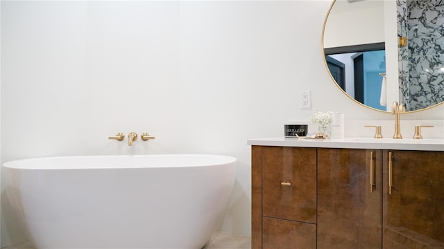 455 Riverfront Dr Unit A302, Palm Coast, FL 32137 - bathroom with vanity, a freestanding bath, and tile patterned floors
