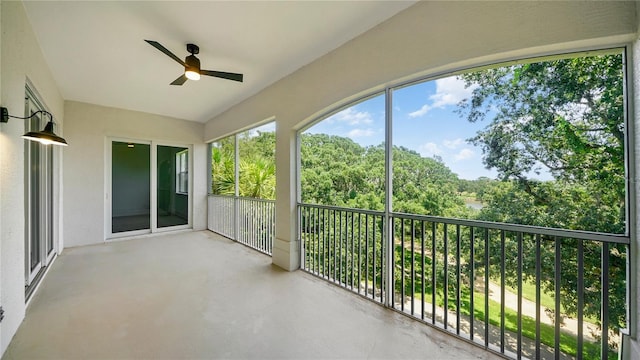 455 Riverfront Dr Unit A302, Palm Coast, FL 32137 - unfurnished sunroom featuring ceiling fan