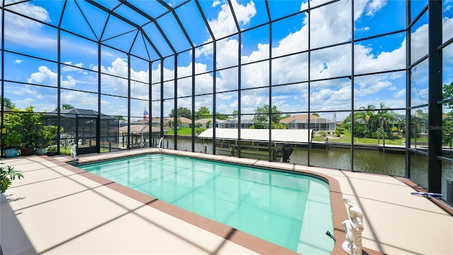 30 Cortes Ct, Palm Coast, FL 32137 - swimming pool with a water view, a lanai, and a patio area