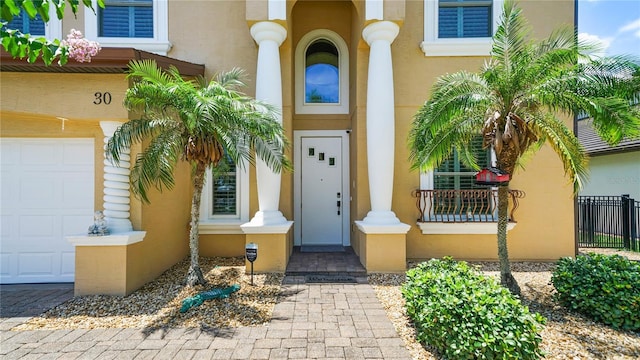 30 Cortes Ct, Palm Coast, FL 32137 - property entrance with stucco siding