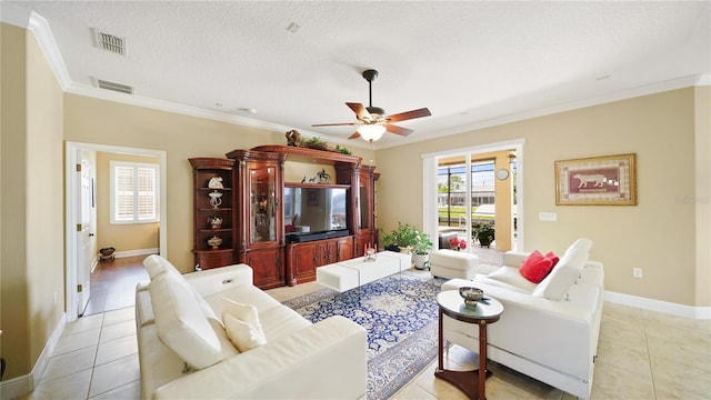 30 Cortes Ct, Palm Coast, FL 32137 - living area with ornamental molding, ceiling fan, light tile patterned floors, and a textured ceiling