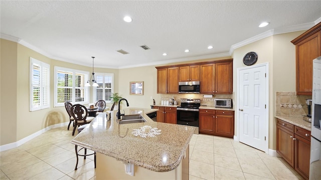 30 Cortes Ct, Palm Coast, FL 32137 - kitchen featuring stainless steel appliances, light tile patterned flooring, backsplash, a breakfast bar, and crown molding