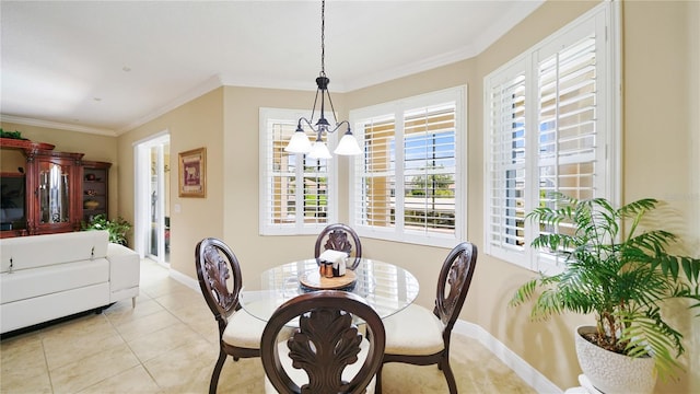 30 Cortes Ct, Palm Coast, FL 32137 - dining area featuring a chandelier, ornamental molding, and light tile patterned floors