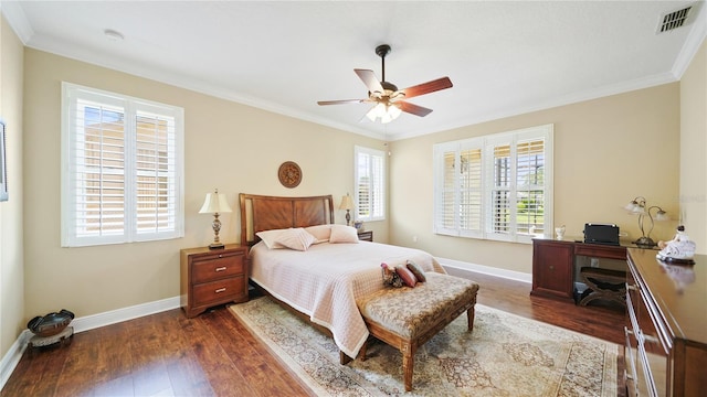 30 Cortes Ct, Palm Coast, FL 32137 - bedroom with dark wood-type flooring, an office area, ornamental molding, and a ceiling fan