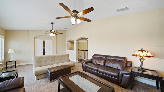 30 Cortes Ct, Palm Coast, FL 32137 - carpeted living area with arched walkways and ceiling fan
