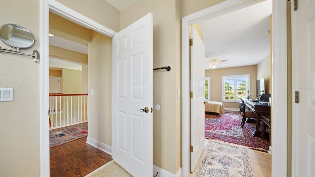 30 Cortes Ct, Palm Coast, FL 32137 - corridor featuring a desk and wood finished floors