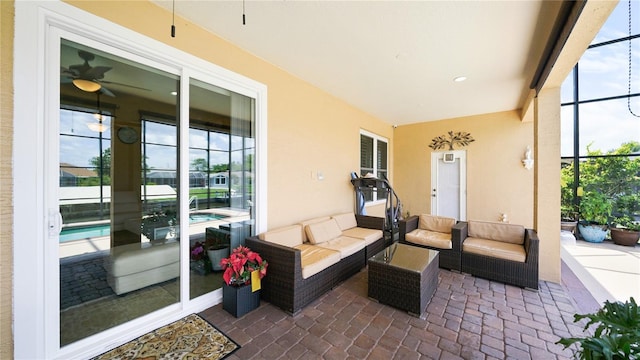 30 Cortes Ct, Palm Coast, FL 32137 - view of patio / terrace featuring glass enclosure, an outdoor hangout area, and ceiling fan