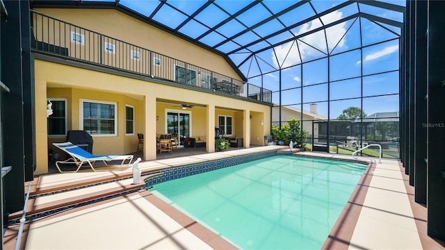 30 Cortes Ct, Palm Coast, FL 32137 - outdoor pool with a patio area, ceiling fan, and a lanai