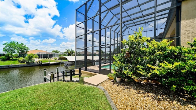 30 Cortes Ct, Palm Coast, FL 32137 - dock area featuring glass enclosure, a water view, and an outdoor pool