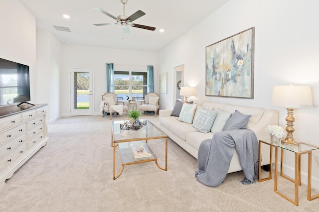 88 Rae Dr, Palm Coast, FL 32164 - carpeted living room with ceiling fan and recessed lighting